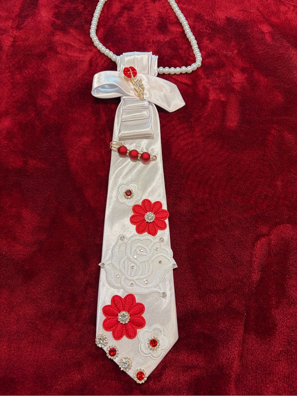 Elegant White Satin Floral Tie Necklace with Red Accents